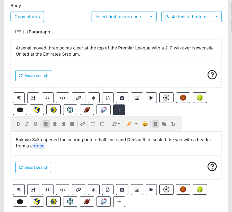 Body section of a New Article with two Paragraph blocks of sample Arsenal match text; the second paragraph is focused with a word selected, showing its formatting toolbar (bold, italic, underline, alignment, link, lists, block type, marker, emoji and paste modes), and each block has a Smart search button and the block icon row.